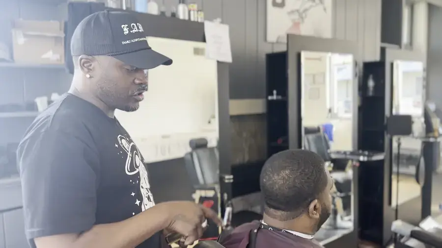 Barber working a fresh cut in the shop, brand film by Pixel Perfect Visuals