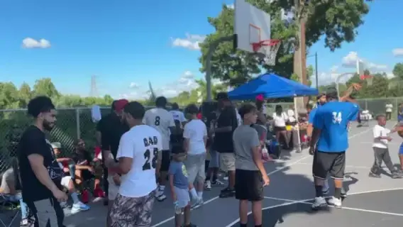 Wide view of the outdoor court and crowd at the 2nd Annual Legends Only Basketball Tournament, filmed by Pixel Perfect Visuals