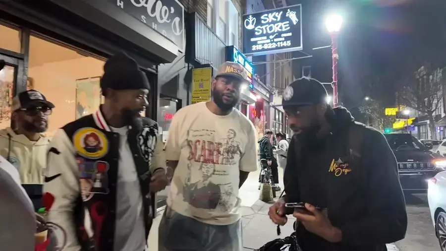 Night street scene outside a South Street shop, culture coverage by 066 Media