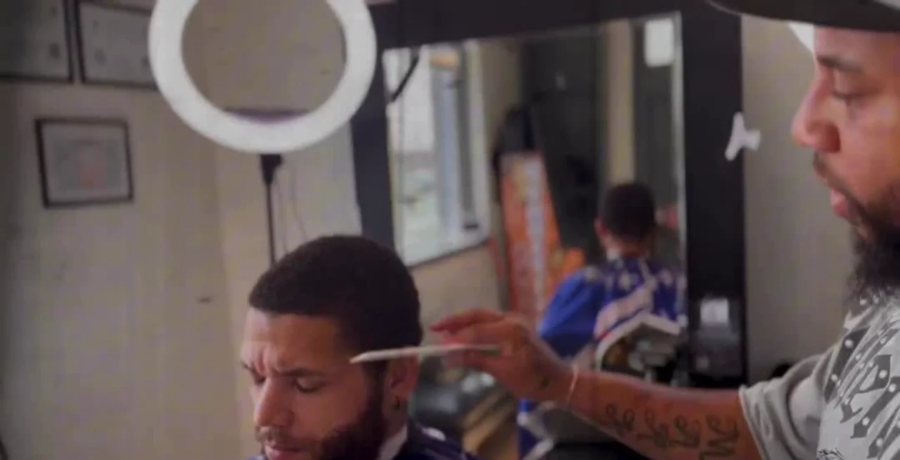 Barbershop brand shoot under a ring light — brand content by Pixel Perfect Visuals