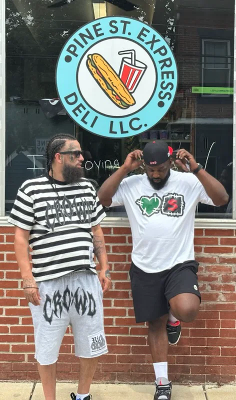 Two friends outside Pine St. Express Deli — street portrait by Pixel Perfect Visuals