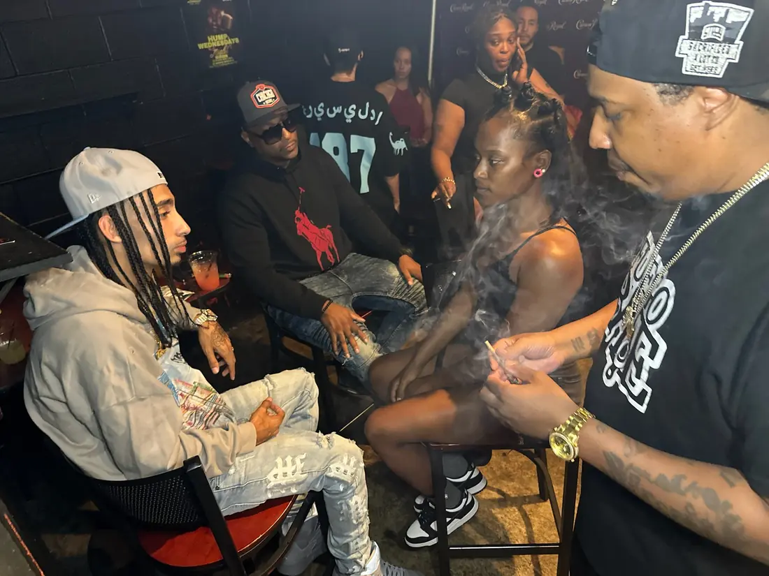 Artists and guests in the lounge seating area on The Rookie Of The Year Tour, nightlife coverage by Pixel Perfect Visuals