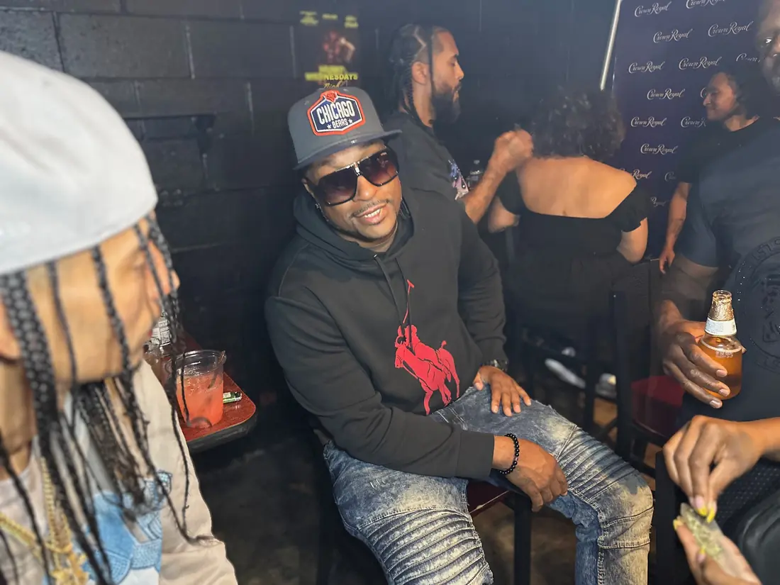 Guest seated against the Crown Royal backdrop at the venue on The Rookie Of The Year Tour, nightlife coverage by Pixel Perfect Visuals